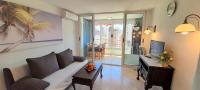 A seating area at Apartment Sea View in Rincon de Loix- free parking, pool, Wi-Fi, new air conditioning