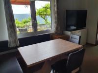 Televízia a/alebo spoločenská miestnosť v ubytovaní Apartment Haus Starfach