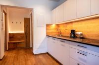 A kitchen or kitchenette at Luisl Hof - Apartment Pomum