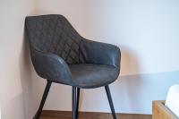 A seating area at Luisl Hof - Apartment Pomum