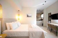 Posteľ alebo postele v izbe v ubytovaní Palm Residences