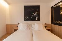 Posteľ alebo postele v izbe v ubytovaní Hotel Cortabitarte
