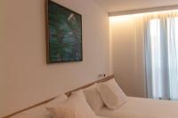 Posteľ alebo postele v izbe v ubytovaní Hotel Cortabitarte