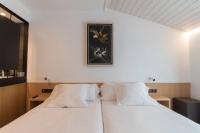 Posteľ alebo postele v izbe v ubytovaní Hotel Cortabitarte