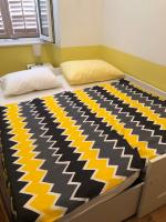 Posteľ alebo postele v izbe v ubytovaní Apartment Tashi, Korzo - Rijeka, 2 bedrooms
