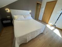Postel nebo postele na pokoji v ubytování Casa y Apartamento Rural Terra Celta en Salceda de Caselas