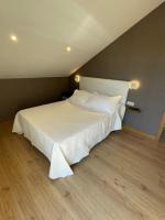 Postel nebo postele na pokoji v ubytování Casa y Apartamento Rural Terra Celta en Salceda de Caselas