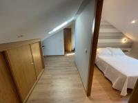 Postel nebo postele na pokoji v ubytování Casa y Apartamento Rural Terra Celta en Salceda de Caselas