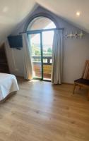 TV a/nebo společenská místnost v ubytování Casa y Apartamento Rural Terra Celta en Salceda de Caselas