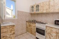Kuchyň nebo kuchyňský kout v ubytování Apartments Jerkunica