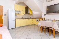 Kuchyň nebo kuchyňský kout v ubytování Apartments Jerkunica