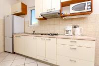 Kuchyň nebo kuchyňský kout v ubytování Apartments Jerkunica