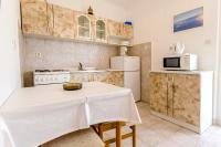 Kuchyň nebo kuchyňský kout v ubytování Apartments Jerkunica