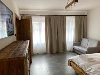 Posteľ alebo postele v izbe v ubytovaní Apartamenty Zander