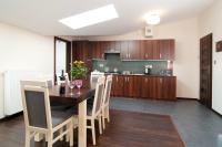Kuchyň nebo kuchyňský kout v ubytování Apartamenty Bonerowska 5