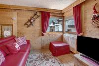 A seating area at Baita dei ski app 2