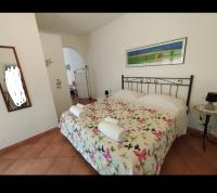 Postel nebo postele na pokoji v ubytování Agriturismo Bio Pian Dei Casali