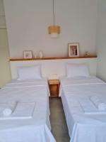 A bed or beds in a room at Ozilvillas