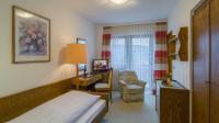 TV a/nebo společenská místnost v ubytování Hotel Schloessmann Garni
