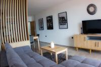 TV a/nebo společenská místnost v ubytování Port Natura Apartment