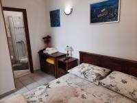 Posteľ alebo postele v izbe v ubytovaní Apartments Zlosilo