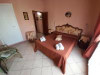 A bed or beds in a room at B&B La Casa di Zia Lina