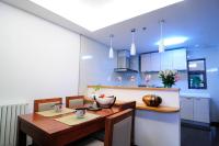 A kitchen or kitchenette at Belgravia Serviced Residence Wuxi