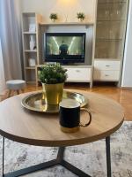 Televízia a/alebo spoločenská miestnosť v ubytovaní MiaLu