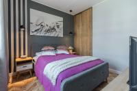 Posteľ alebo postele v izbe v ubytovaní Lead Apartment