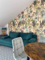 A seating area at Fit Paradise Apartman