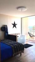 Posteľ alebo postele v izbe v ubytovaní Panorama Suite & Spa