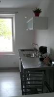 Kuchyňa alebo kuchynka v ubytovaní Appartement entre le port et le centre ville de Perros Guirec