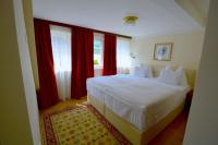 A bed or beds in a room at Hotel See-Villa