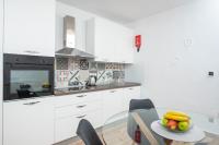 Kuchyň nebo kuchyňský kout v ubytování Apartment Kiki