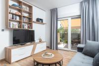 TV a/nebo společenská místnost v ubytování Apartment Kiki