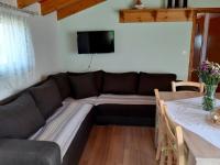 A television and/or entertainment centre at Traditional house in Akamatra square