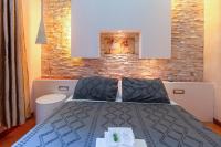 Posteľ alebo postele v izbe v ubytovaní Aurora Garden Lodging - Rooms & Apartment
