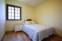 Posteľ alebo postele v izbe v ubytovaní Casa con vistas al mar en Cambados