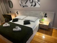 Posteľ alebo postele v izbe v ubytovaní MEMORI bed&breakfast