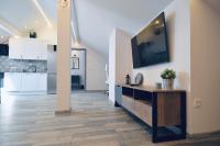 Kuchyňa alebo kuchynka v ubytovaní Apartamenty Żołnierska 31 - Apartament nr 1