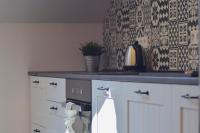 Kuchyňa alebo kuchynka v ubytovaní Apartamenty Żołnierska 31 - Apartament nr 1