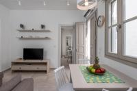 TV a/nebo společenská místnost v ubytování cattleya suite lindos