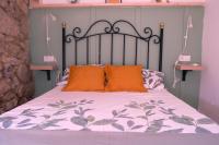 A bed or beds in a room at A casa da Penela