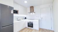 Kuchyň nebo kuchyňský kout v ubytování OleHolidays 233 Romana Playa vistas al mar