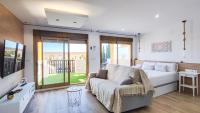 TV a/nebo společenská místnost v ubytování OleHolidays 233 Romana Playa vistas al mar