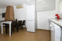 Kuchyňa alebo kuchynka v ubytovaní Rentalmar Villa Covamar families only