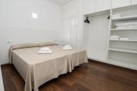 Posteľ alebo postele v izbe v ubytovaní Rentalmar Villa Covamar families only
