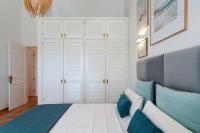 A bed or beds in a room at Stunning Villa with Breathtaking Ocean View