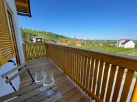 A balcony or terrace at Kellerstöckl Huber in Eisenberg