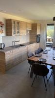 Kuchyň nebo kuchyňský kout v ubytování Appartement Le Grand Duc